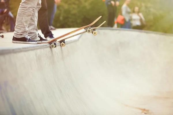 Skaters on a concrete ramp