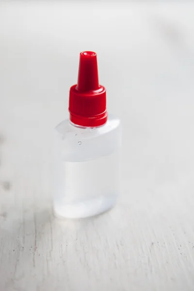 E-cig vaping glycerin liquid in transparent bottle
