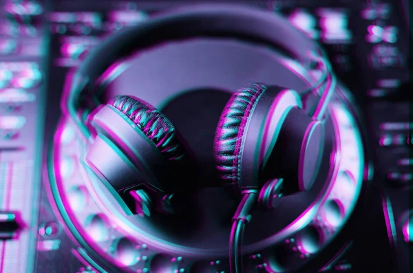 Illustration of DJ headphones edited with 3d stereo effect.Professional disc jockey headset with anaglyph filter.Play and listen to the music with headphone equipment on stage