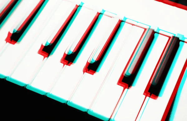 Synthesizer midi keyboard black and white keys edited with retro 3d stereo effect.Vintage red and green anaglyph filter.Professional sound recording studio equipment for music composer