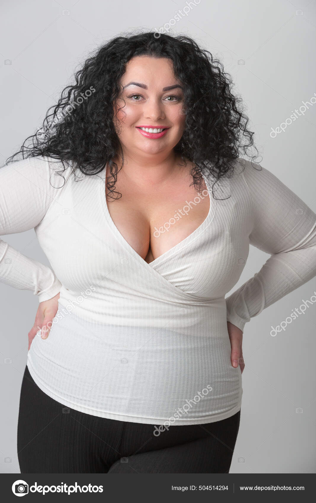 Size Woman Friendly Toothy Smile Oversized Model Deep Cleavage Big Stock  Photo by ©hurricanehank 504514294