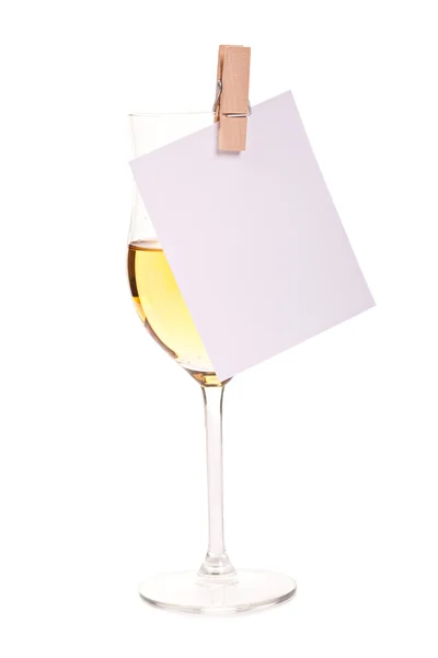 Copos sozinhos de champanhe witn cartão em branco — Fotografia de Stock
