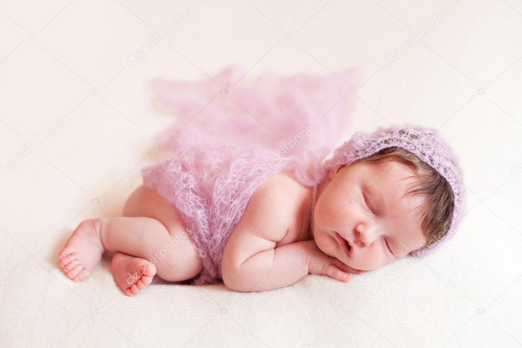 Newborn baby girl in pink shawl set