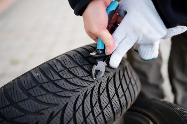 Nail in tyre stock image. Image of damaged, auto, automobile - 75645735