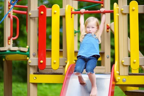 Little girl having fun on a playground — Stock Photo, Image