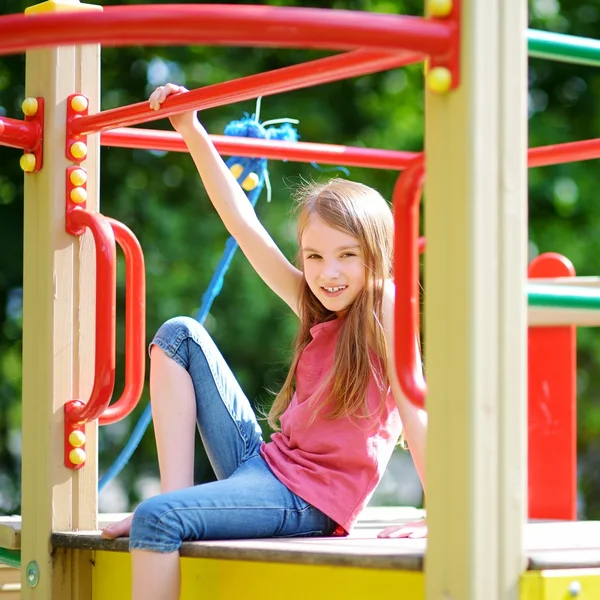 Little girl having fun on playground — Stock Photo, Image