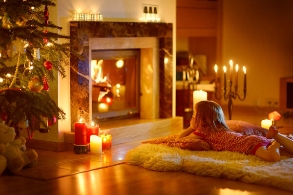 Girl near fireplace