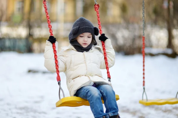 Little girl on swing — Stock Photo, Image