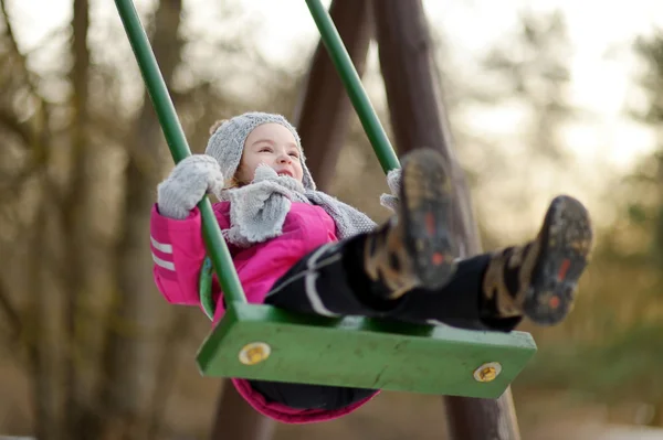 Little girl on swing — Stock Photo, Image