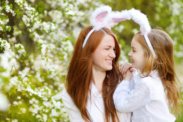 Mother and daughter wearing bunny ears — Stock Photo, Image