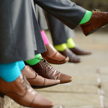 Colorful socks of groomsmen clipart
