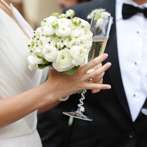 Bride and groom with champagne