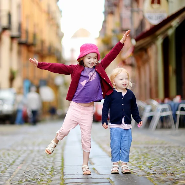 Little sisters having fun outdoors — Stock Photo, Image
