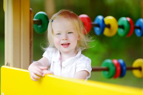 Little toddler girl having fun — Stock Photo, Image