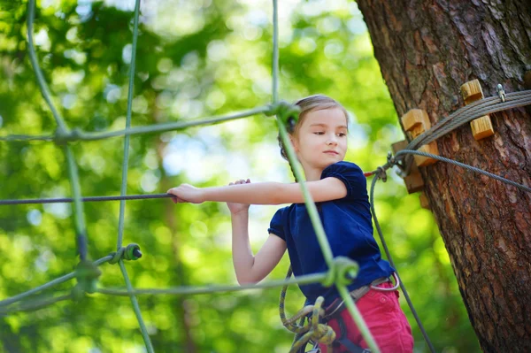 Little girl  in adventure park — Stock Photo, Image