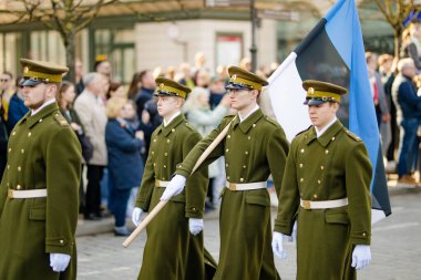 VILNIUS, LITHUANIA - MARCH 11, 2025: Festive parade as Lithuania marked the 35th anniversary of its independence restoration. Parade participants carrying national flags. Kovo 11.