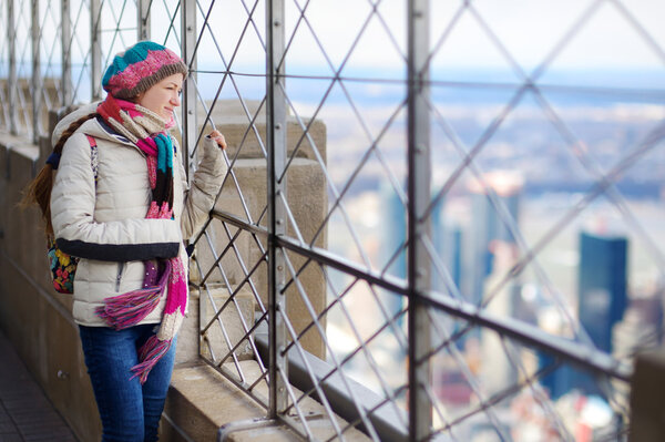 Young tourist enjoying the view of New York panorama