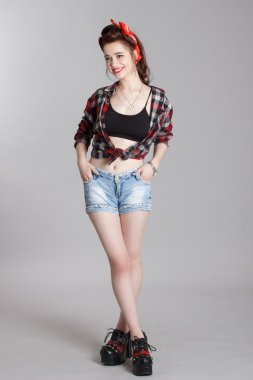 Güzel ve genç birbayan pin-up tarzı portresi.