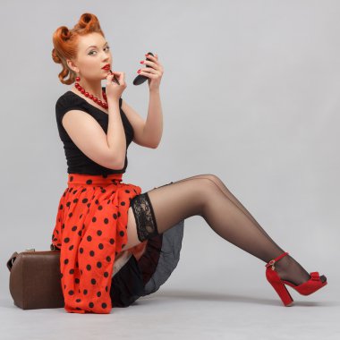 Beautiful woman in a pin-up clipart