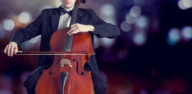 Cellist playing classical music clipart