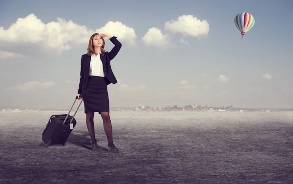 Businesswoman with suitcase — Stock Photo, Image