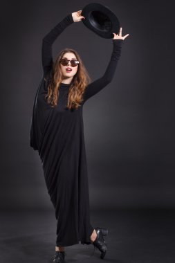 Girl dancing in  black dress