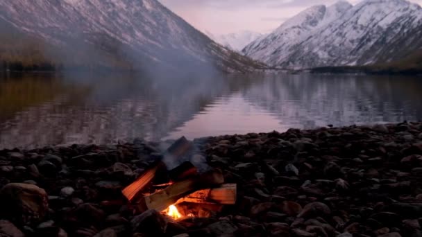 Bonfire on the bank of Lower Multinskoe lake in t