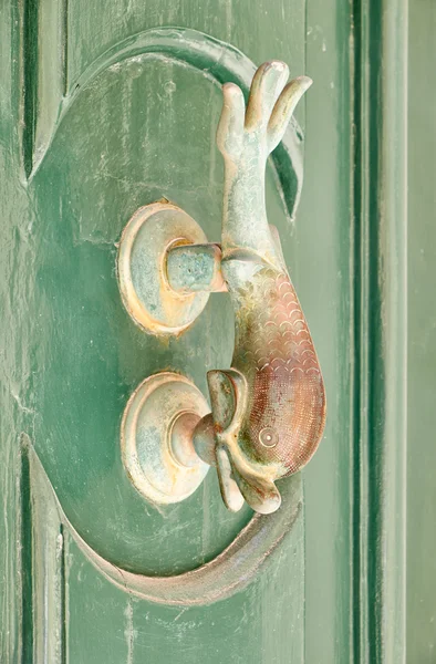 A decorative Bronze Door Handle, Mdina, Malta
