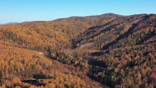 Aerial view of Ski slope on Belokurikha-2, Mishina Gora in autumn, Aerial view. Altai Krai, Russia. — Stock Footage Aerial View Ski Slope Belokurikha Mishina Gora Autumn Aerial View Stock Footage