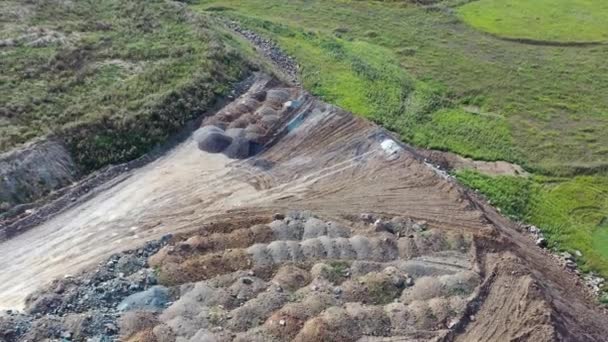 Aerial video of mining rock dumps. Camera looks down and moves backwards. Siberia, Russia — Stock Footage Aerial Video Mining Rock Dumps Camera Looks Moves Backwards Siberia Stock Footage