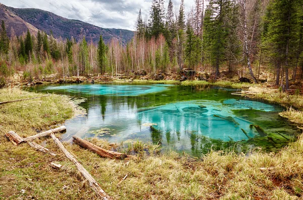 So-called blue geyser lake in Altay mountains — Stock Image So-called blue geyser lake in Altay mountains Stock Photo
