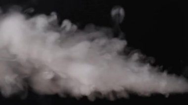 fast appearing steam on black background