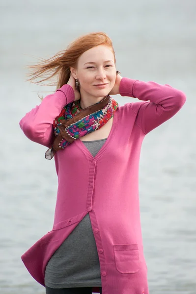 Outdoor portrait of a beautiful redhead woman — Stock Photo, Image