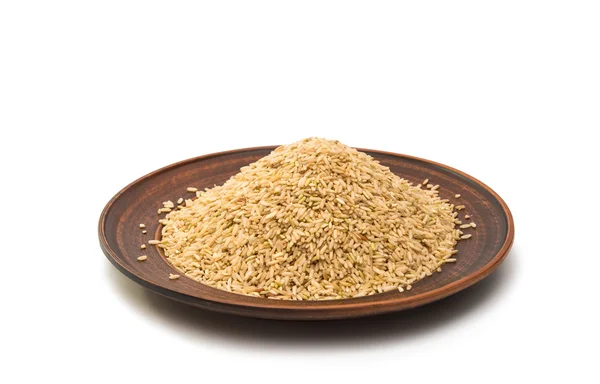 Rice in a clay plate isolated — Stock Photo, Image