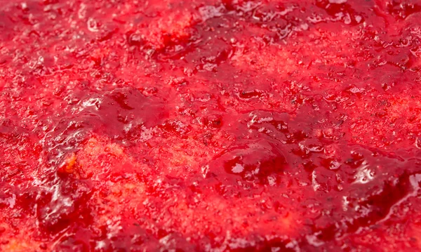 Sfondo di marmellata di lamponi. macro — Foto Stock