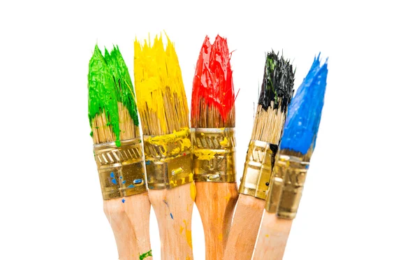 Brushes with colorful paints — Stock Photo, Image