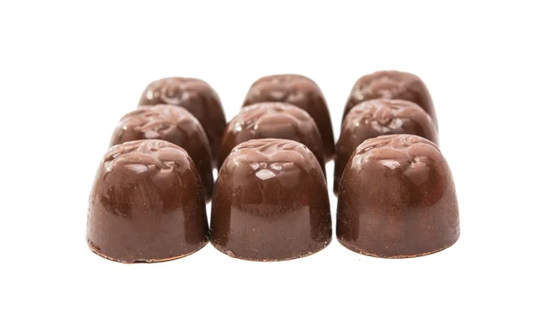 Caramelo de chocolate con cereza aislada — Foto de Stock