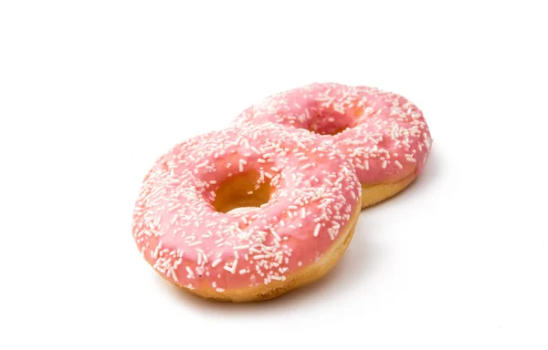 Donut em um esmalte rosa isolado — Fotografia de Stock