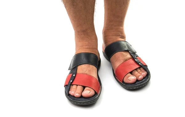 Men's feet in leather sandals — Stock Photo, Image