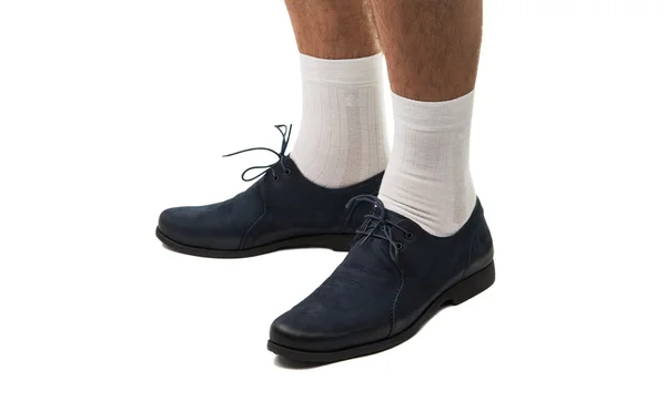 Ein Mann mit Schuhen und Socken — Stockfoto