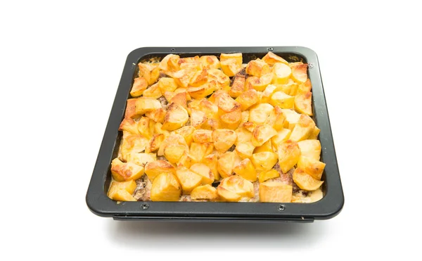 Patatas al horno en una bandeja para hornear —  Fotos de Stock