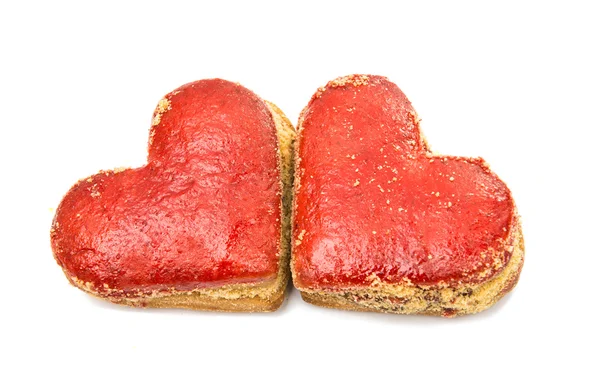 Cookies corações em gelo vermelho isolado — Fotografia de Stock