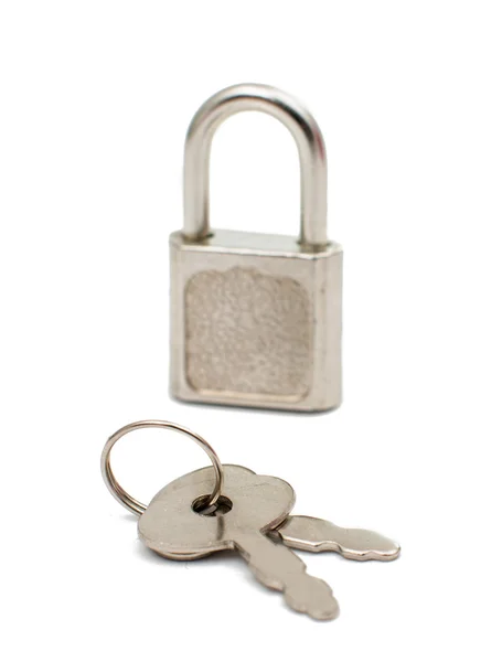 Metal padlock with keys on a ring — Stock Photo, Image