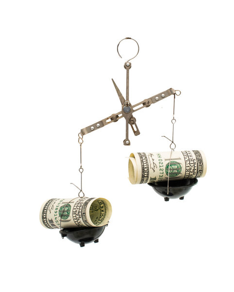 dollars on the scales 