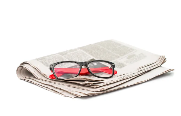 Zeitung mit Brille — Stockfoto