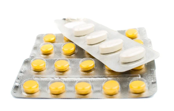 Żółte tabletki — Zdjęcie stockowe
