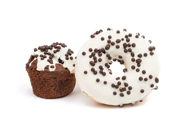 Rosquillas y magdalenas vidriadas — Foto de Stock