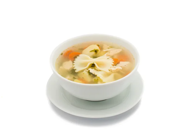 Куриный суп в тарелке — стоковое фото