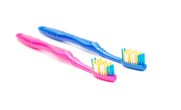 Kuas gigi merah muda dan biru — Stok Foto