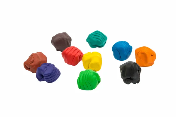 Моделирующий глиняный шар разных цветов — стоковое фото